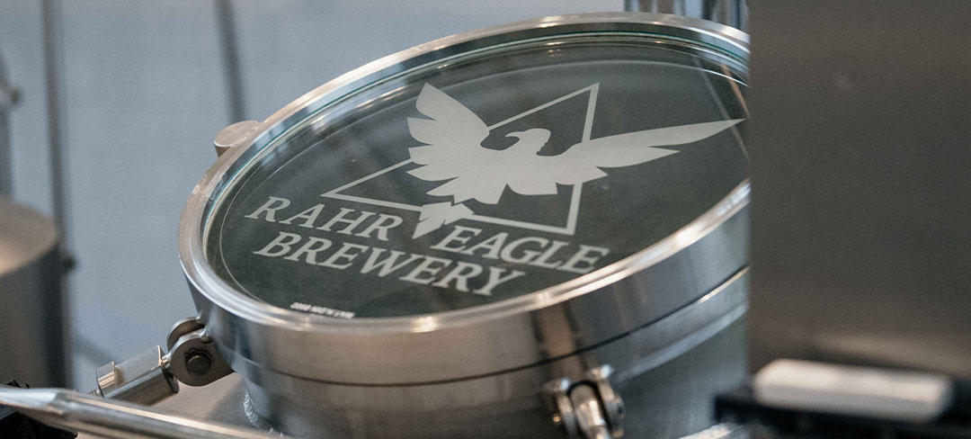 Rahr Eagle Brewery logo on stainless steel brewing vessel.